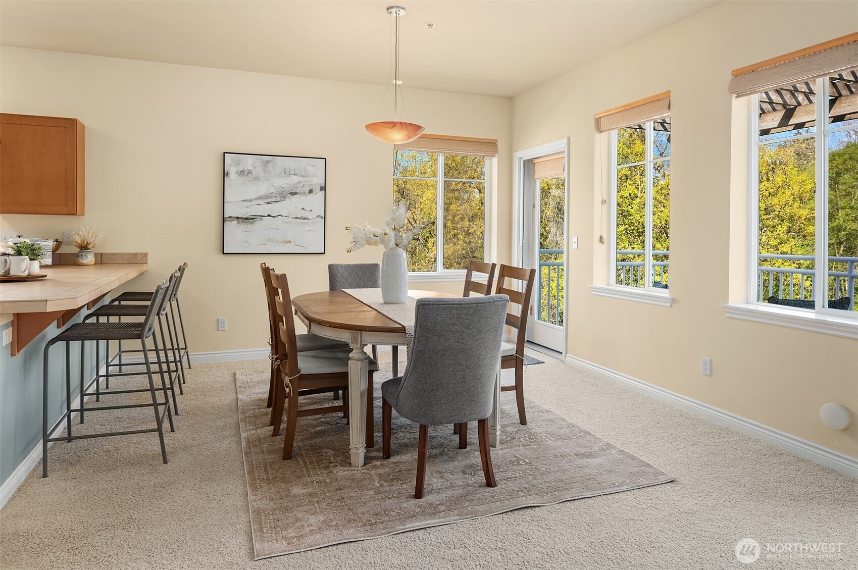 17432 Bothell Way Northeast, Unit B305 Bothell, WA 98011 - Photo 17 of 39 a view of a dining room with furniture window and outside view
