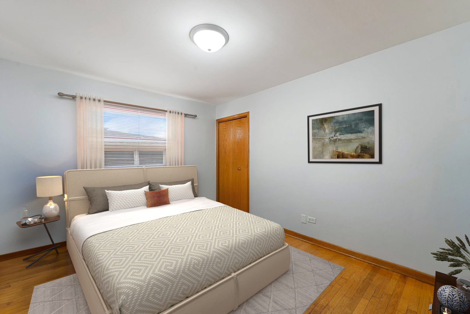 4613 Madison Avenue Brookfield, IL 60513 - Photo 13 of 33 a bedroom with a bed and a window