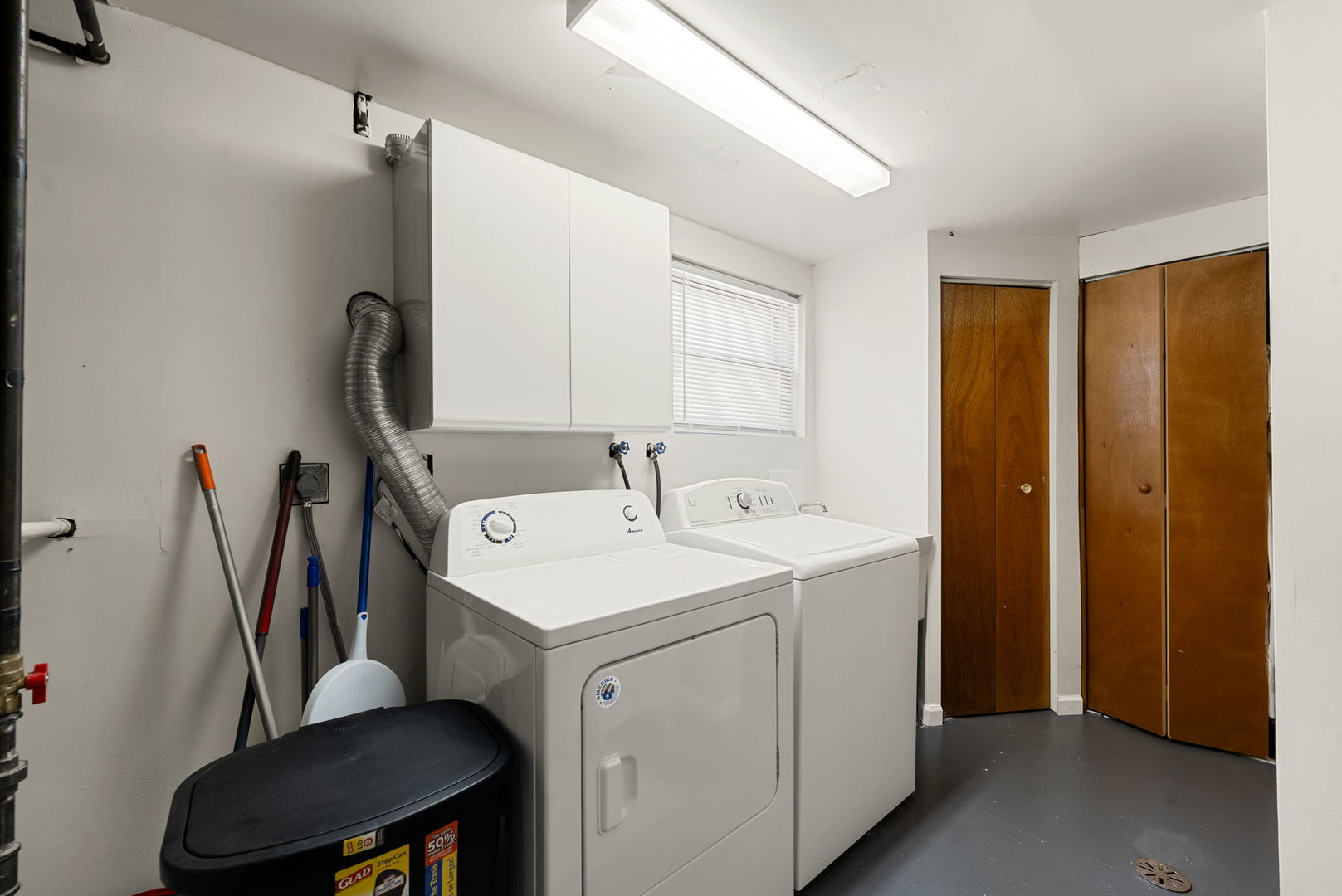 4613 Madison Avenue Brookfield, IL 60513 - Photo 22 of 33 a utility room with dryer and washer