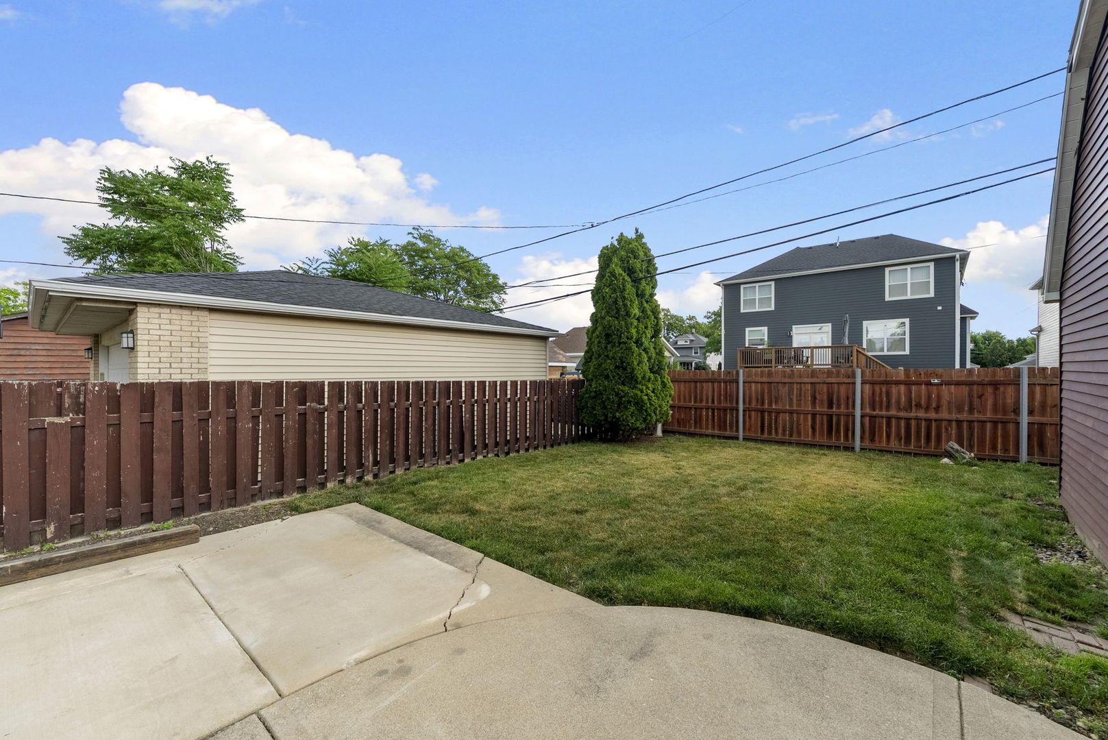 4613 Madison Avenue Brookfield, IL 60513 - Photo 27 of 33 a view of a backyard with wooden fence