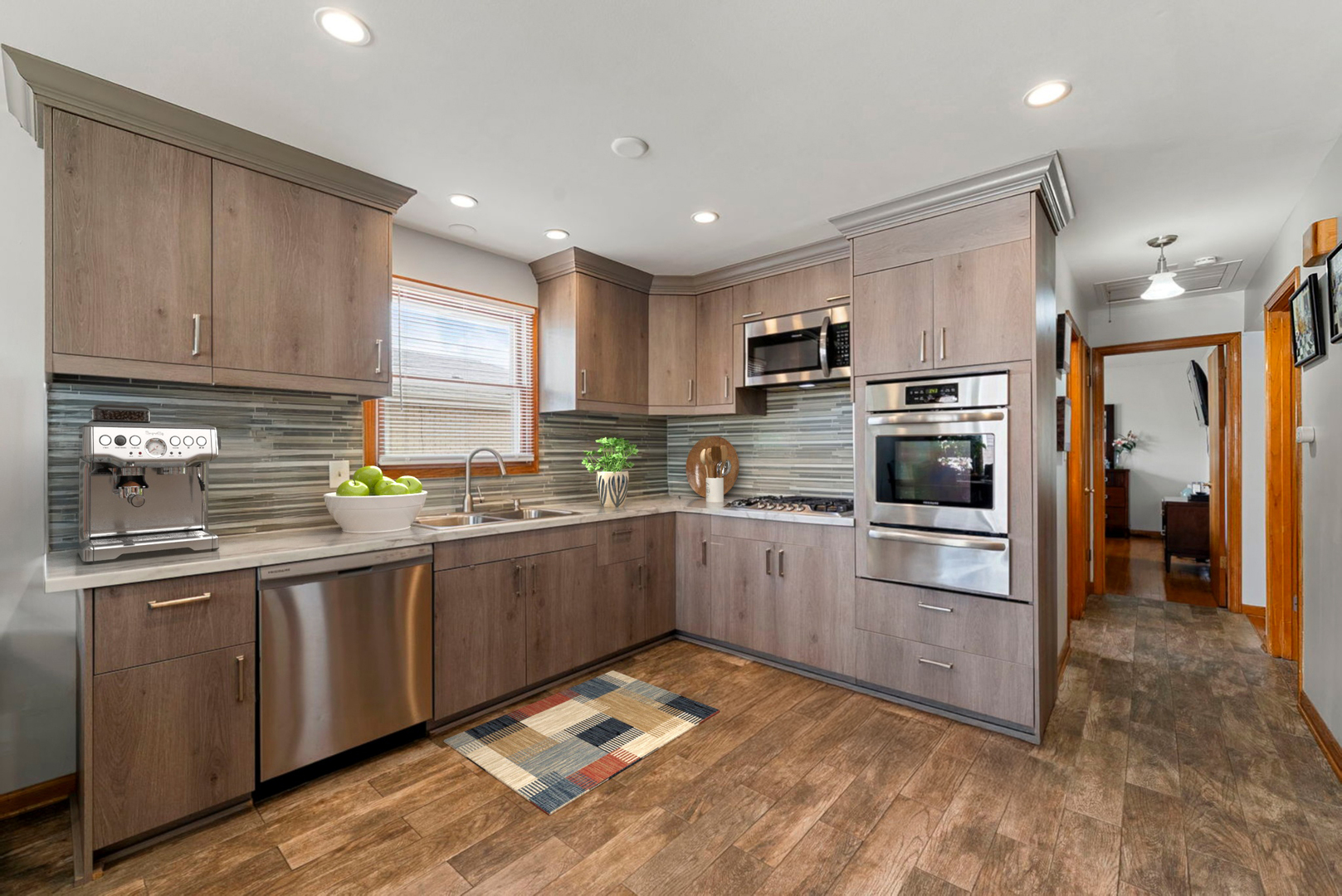 4613 Madison Avenue Brookfield, IL 60513 - Photo 6 of 33 a kitchen with granite countertop a sink stainless steel appliances and cabinets