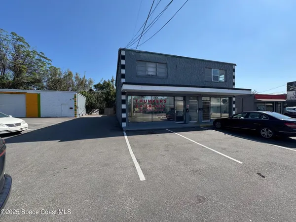 a car parked in front of a building