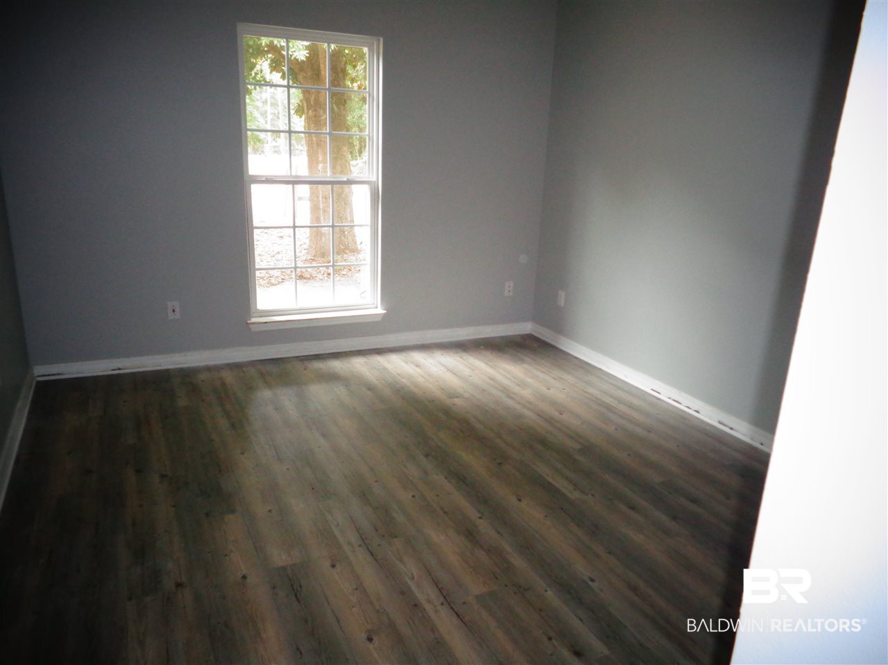27020 Lake Road Orange Beach, AL 36561 - Photo 7 of 30 Front Bedroom 14x12. New floor