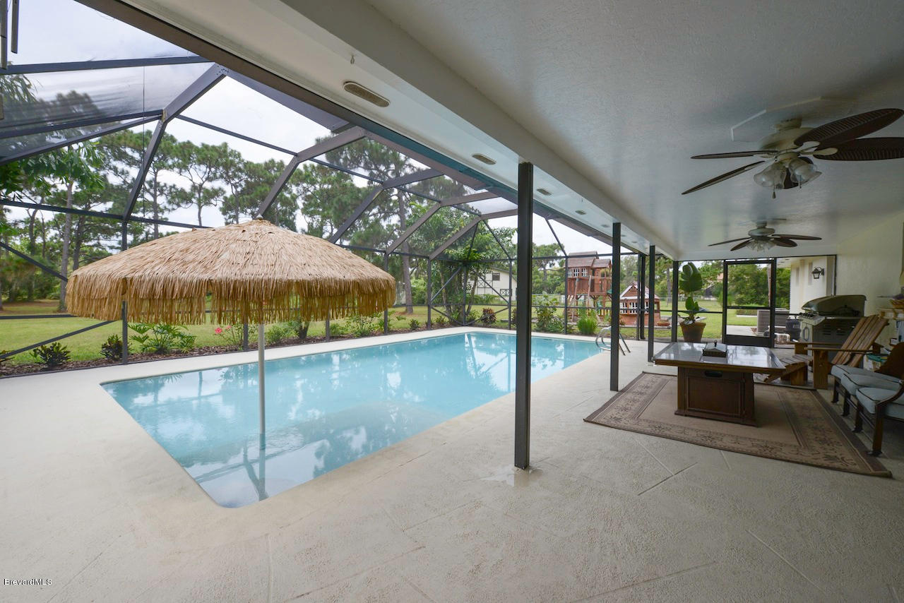 3630 Turtle Mound Road Melbourne, FL 32934 - Photo 3 of 21 Tropical Pool Deck Area