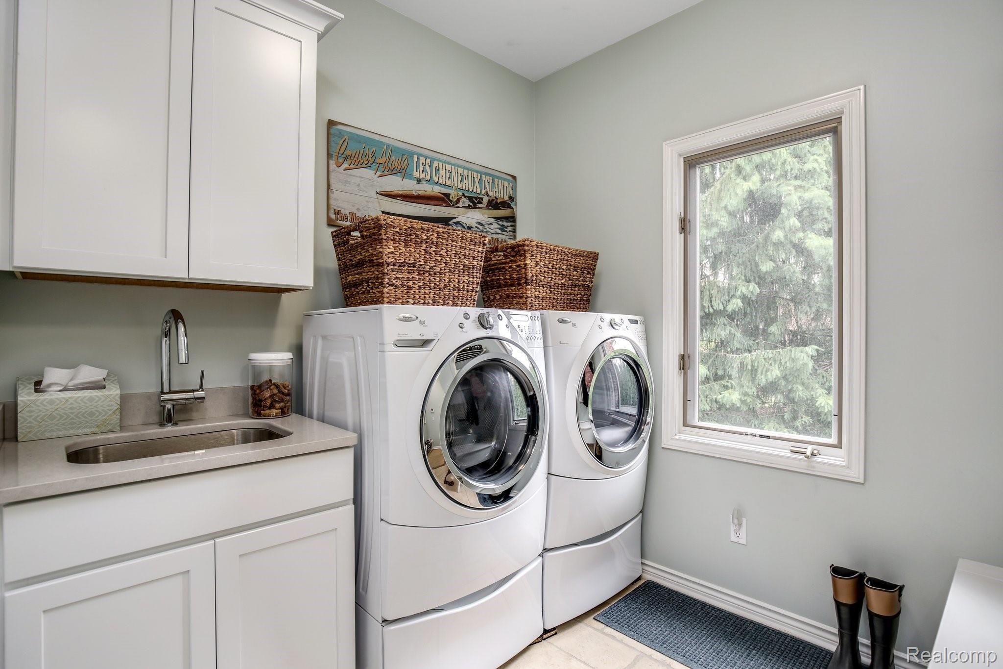 7256 Forest Way Drive Brighton, MI 48116 - Photo 39 of 42 Well appointed laundry room on the main level