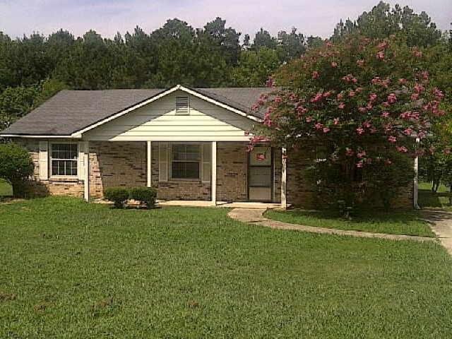 3550 Hopkins Road Powder Springs, GA 30127 - Photo 1 of 1 a view of a house with backyard and garden