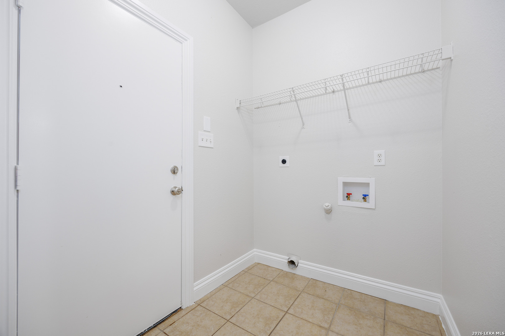 12 Lockspring San Antonio, TX 78254 - Photo 14 of 35 a view of a room with racks on the wall