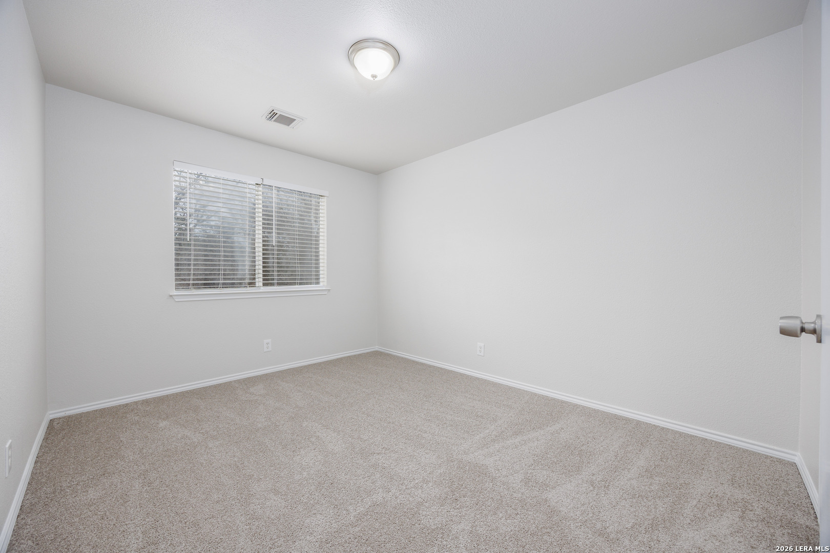 12 Lockspring San Antonio, TX 78254 - Photo 15 of 35 an empty room with a window