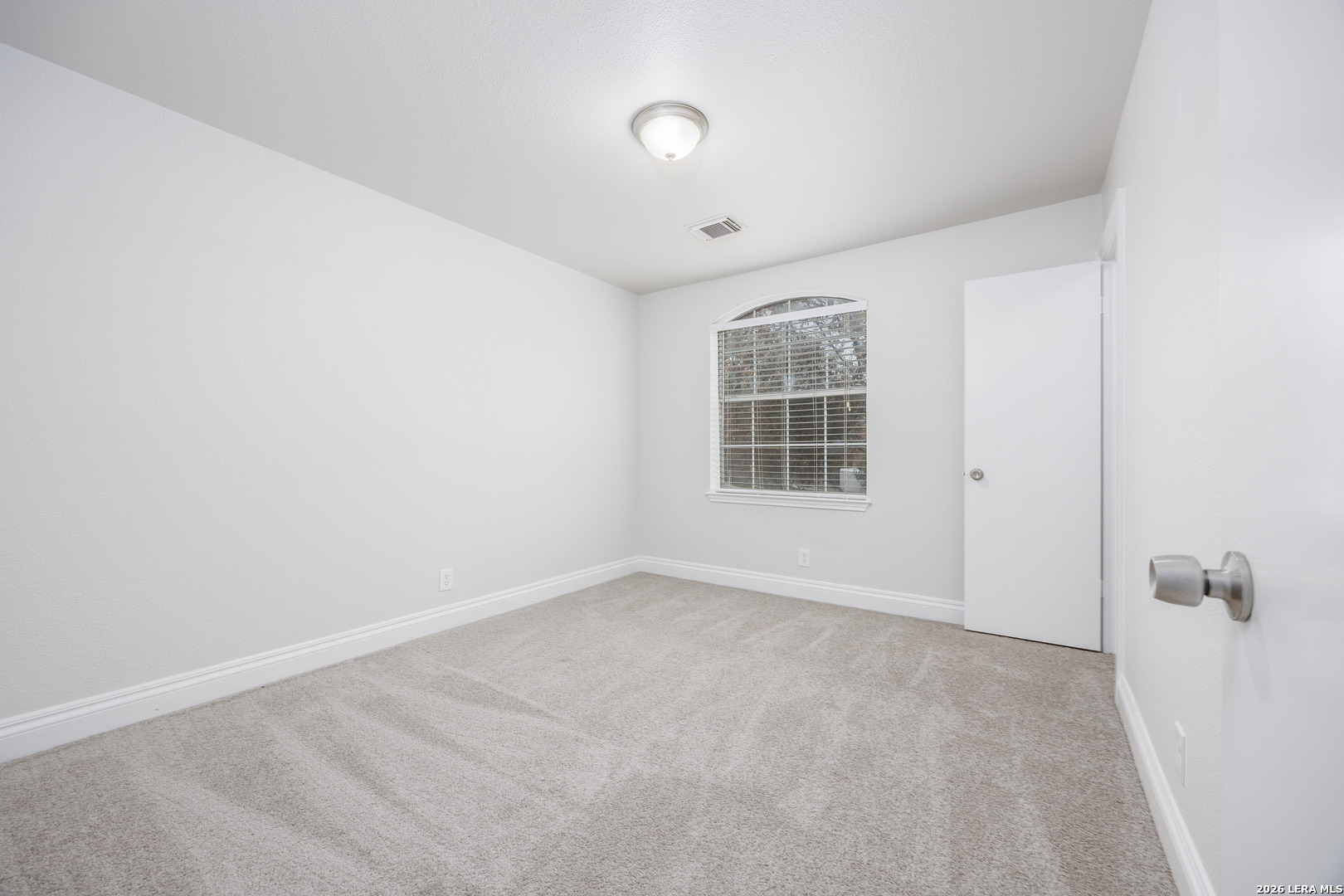 12 Lockspring San Antonio, TX 78254 - Photo 17 of 35 an empty room with windows