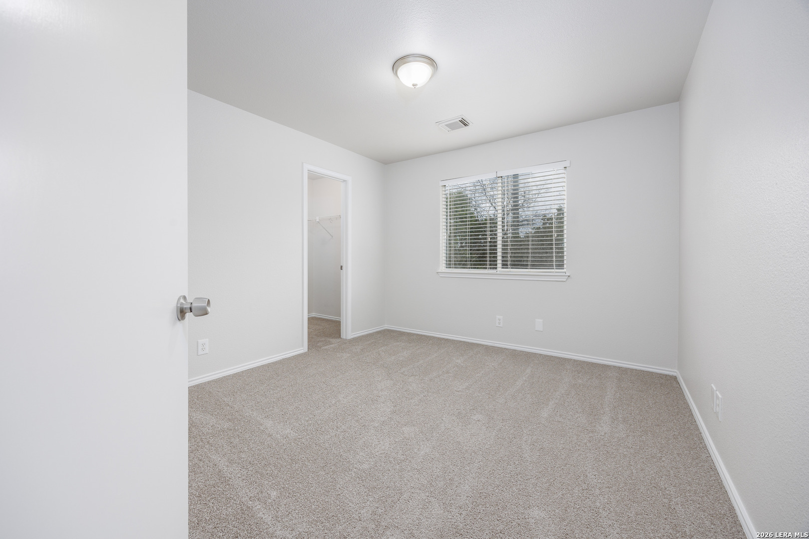12 Lockspring San Antonio, TX 78254 - Photo 19 of 35 an empty room with windows and closet