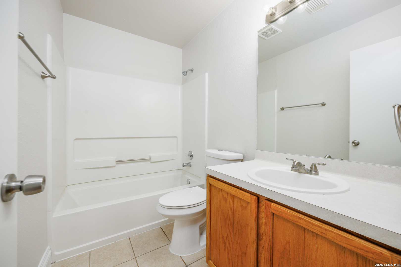 12 Lockspring San Antonio, TX 78254 - Photo 21 of 35 a bathroom with a sink toilet and shower