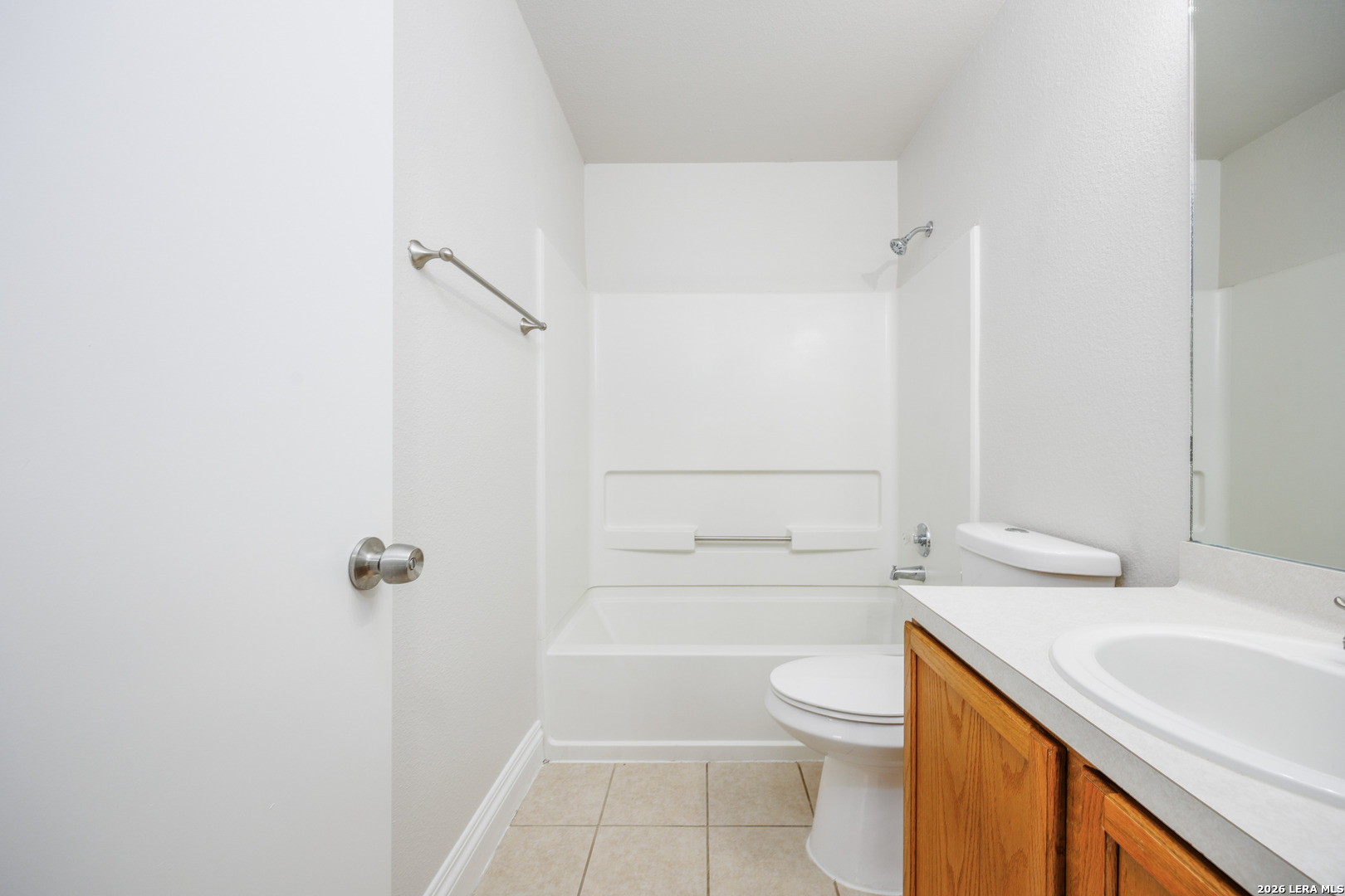 12 Lockspring San Antonio, TX 78254 - Photo 22 of 35 a bathroom with a sink a toilet and shower