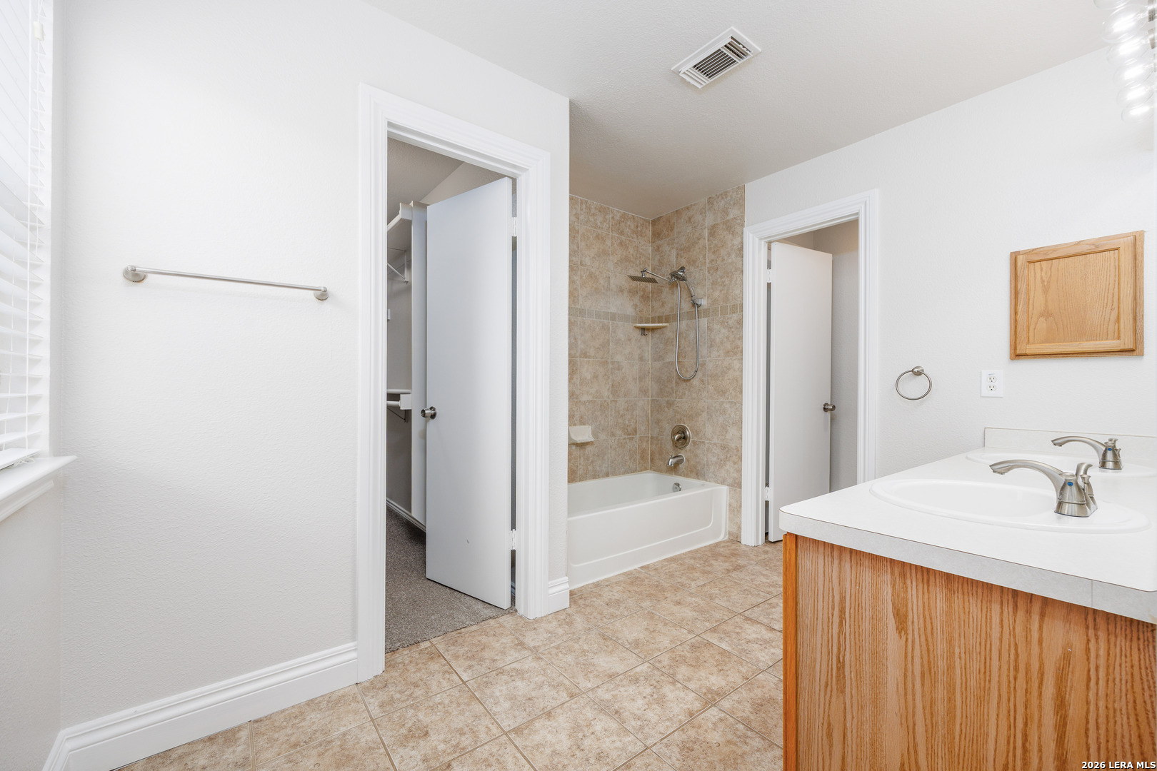 12 Lockspring San Antonio, TX 78254 - Photo 26 of 35 a bathroom with a sink and a shower
