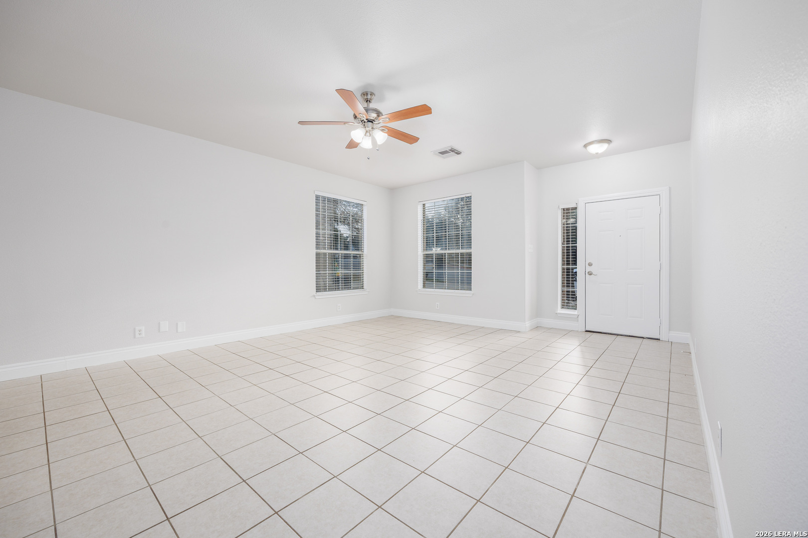 12 Lockspring San Antonio, TX 78254 - Photo 5 of 35 a view of an empty room with a window