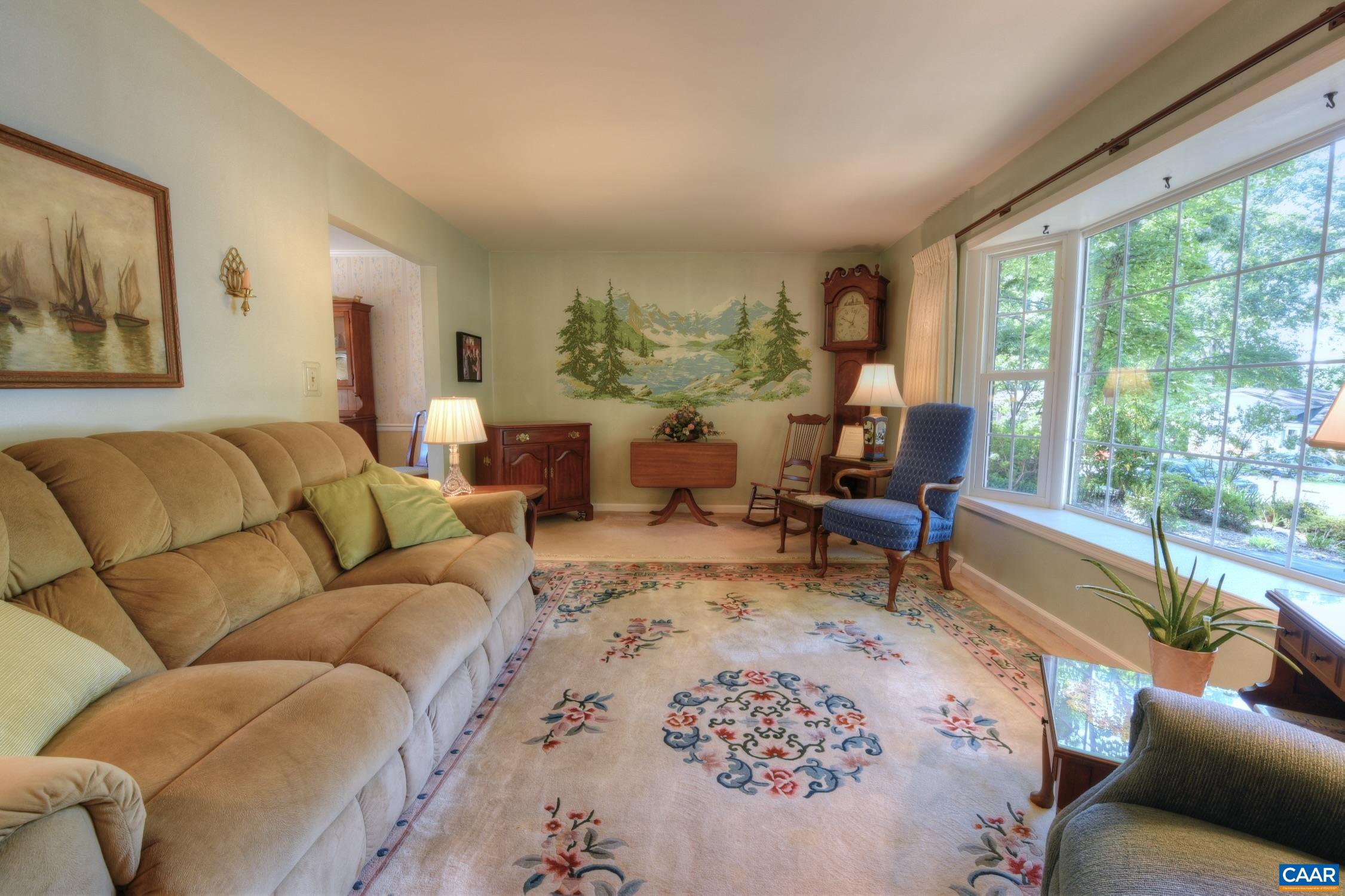 727 Village Road Charlottesville, VA 22903 - Photo 6 of 34 a living room with furniture and a large window