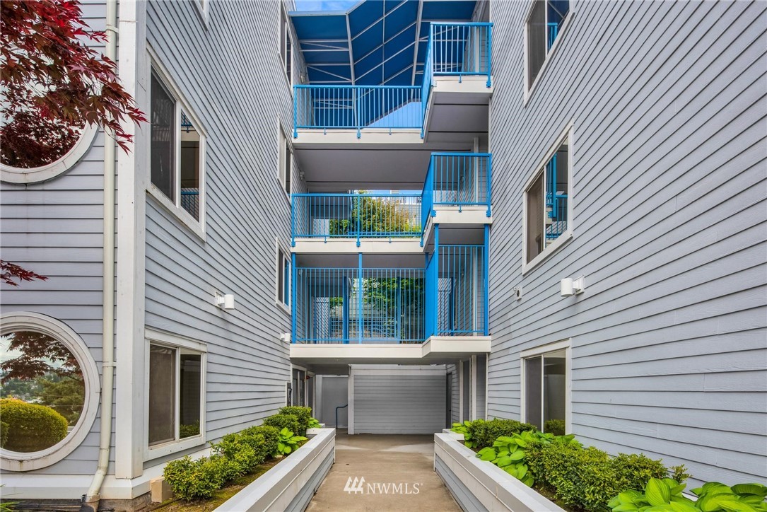 2244 13th Avenue West, Unit 115 Seattle, WA 98119 - Photo 3 of 19 a view of house and front door