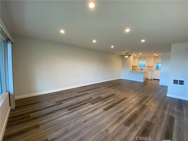 a view of livingroom and hardwood floor