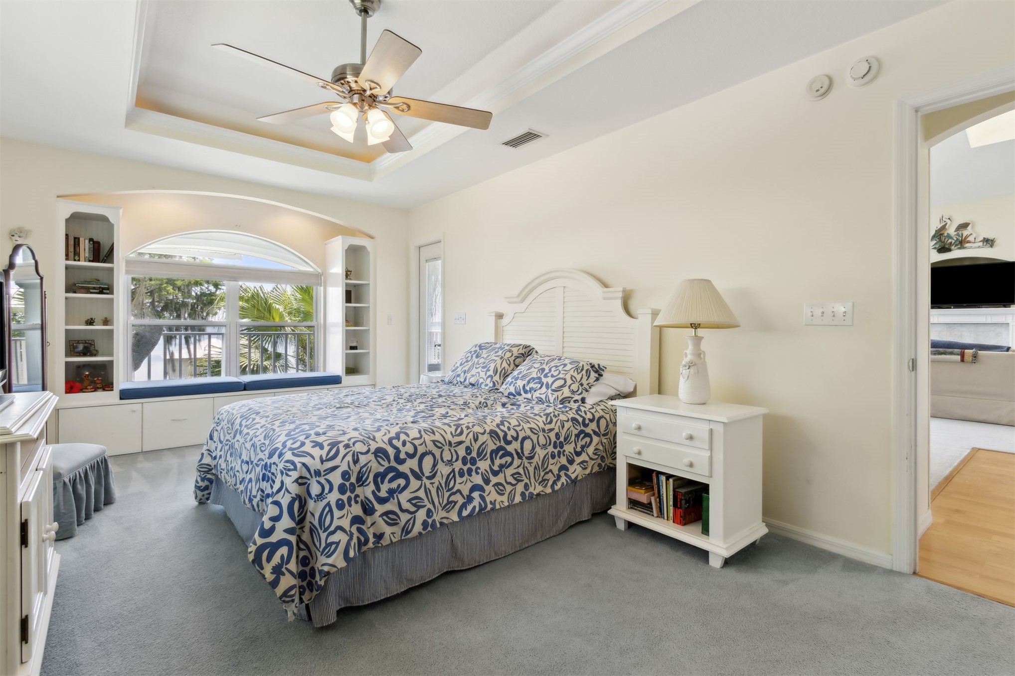 4333 Seminole Street Starke, FL 32091 - Photo 16 of 33 a bed room with a bed and a chandelier