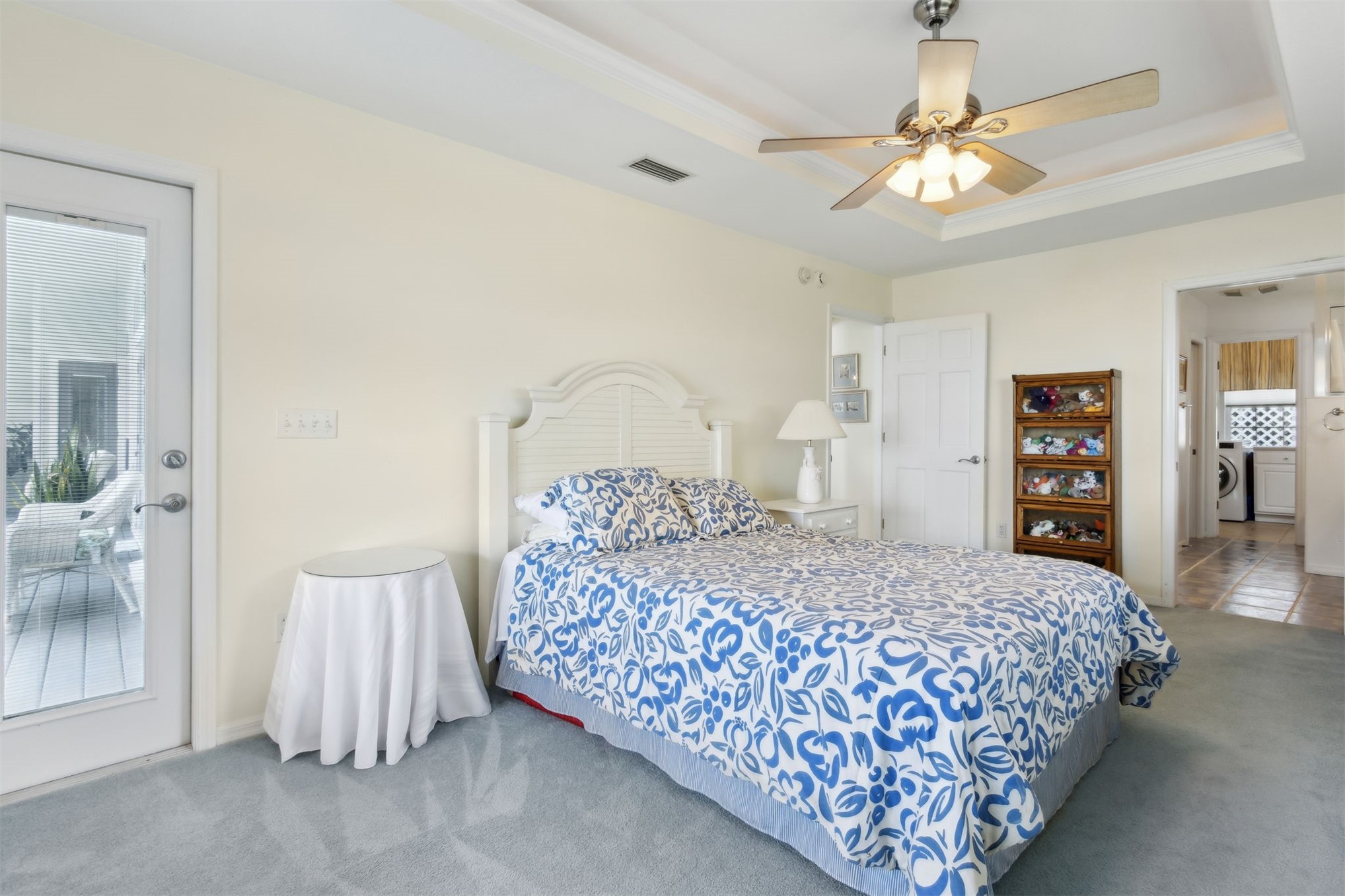 4333 Seminole Street Starke, FL 32091 - Photo 17 of 33 a bedroom with a large bed and a chandelier