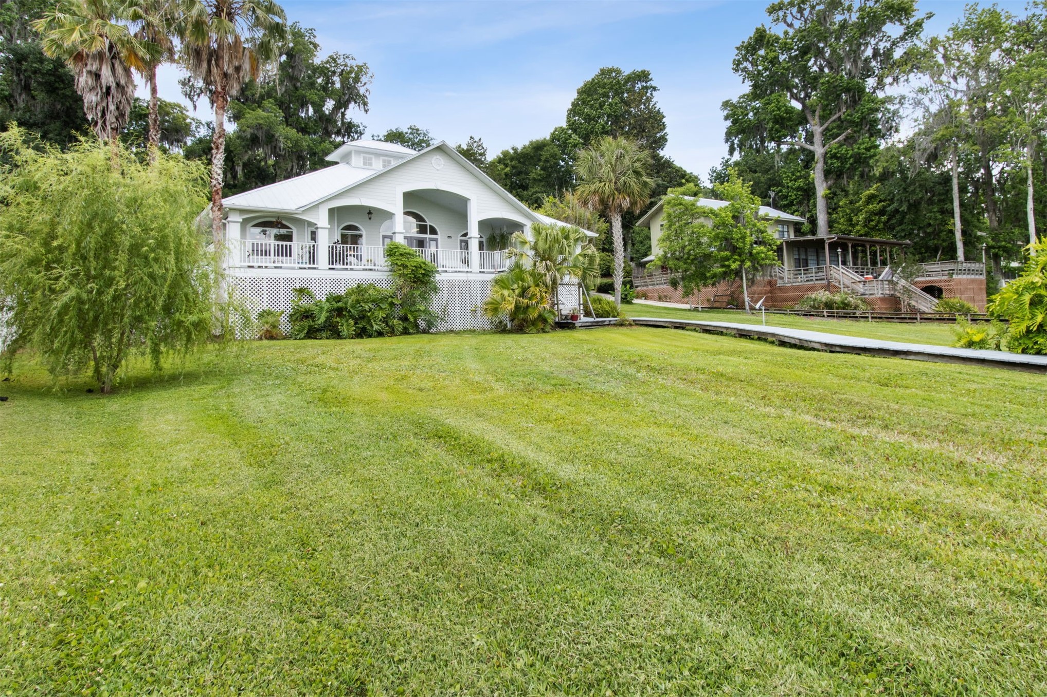4333 Seminole Street Starke, FL 32091 - Photo 26 of 33 a front view of a house with garden