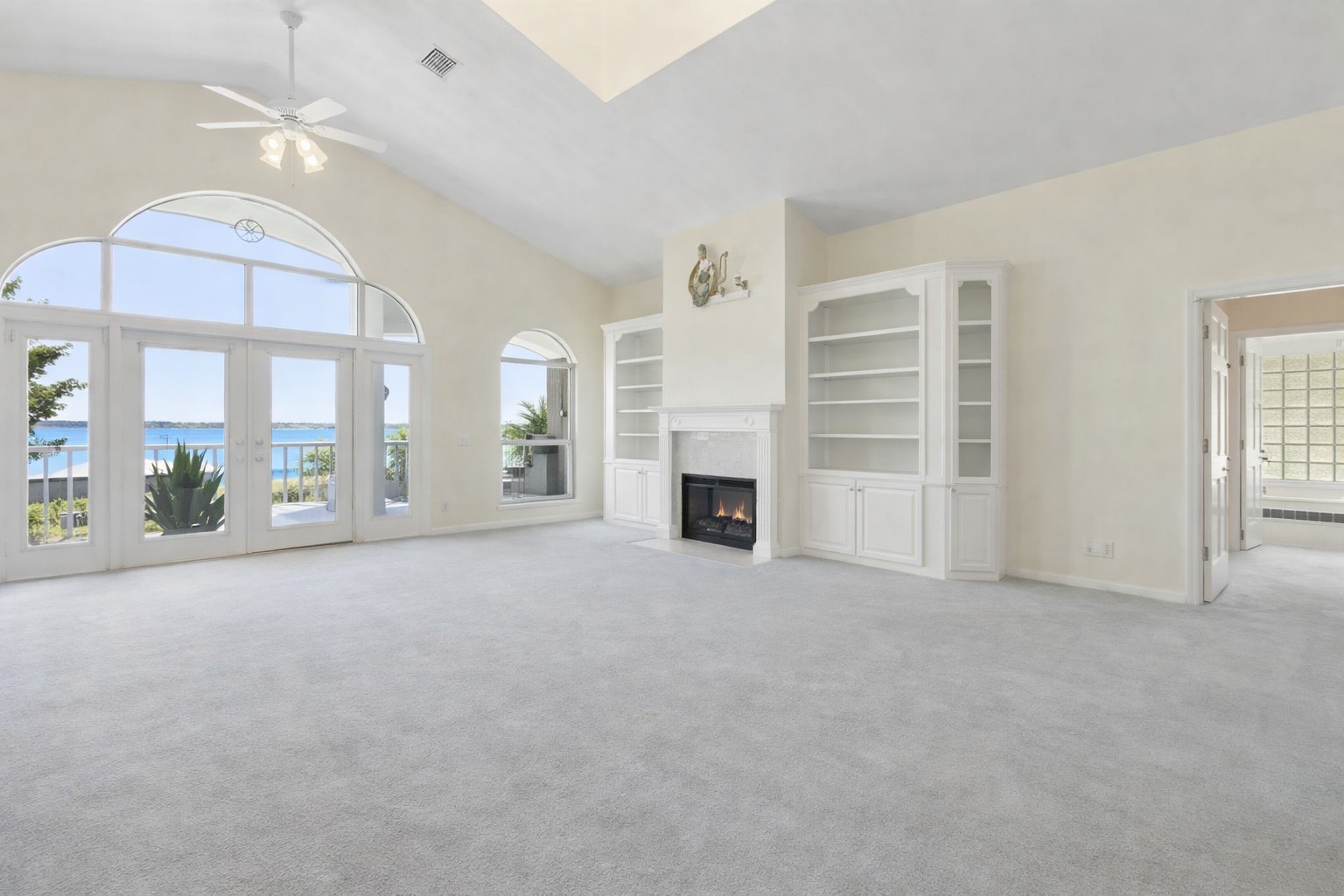 4333 Seminole Street Starke, FL 32091 - Photo 6 of 33 a view of an empty room with a fireplace and a window