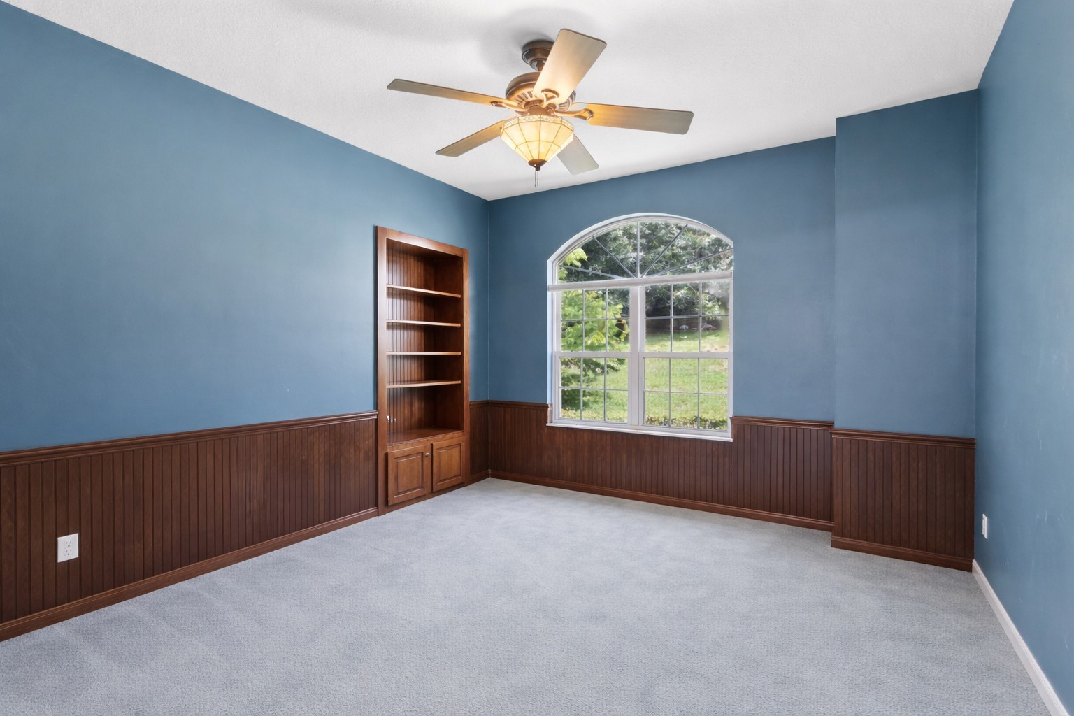 4333 Seminole Street Starke, FL 32091 - Photo 9 of 33 an empty room with windows and ceiling fan