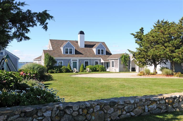 28 Point Road Marion, MA 02738 - Photo 2 of 11 a front view of house with yard and green space
