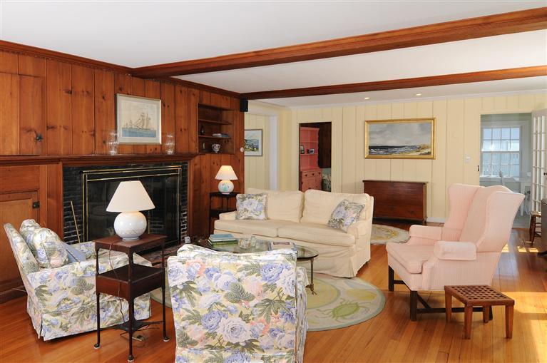 28 Point Road Marion, MA 02738 - Photo 6 of 11 a living room with furniture a fireplace and decor