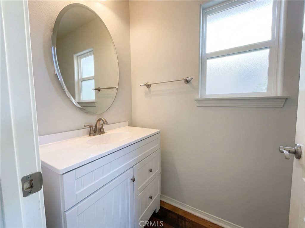 28745 Edenton Way Temecula, CA 92591 - Photo 7 of 23 a bathroom with a sink and a mirror