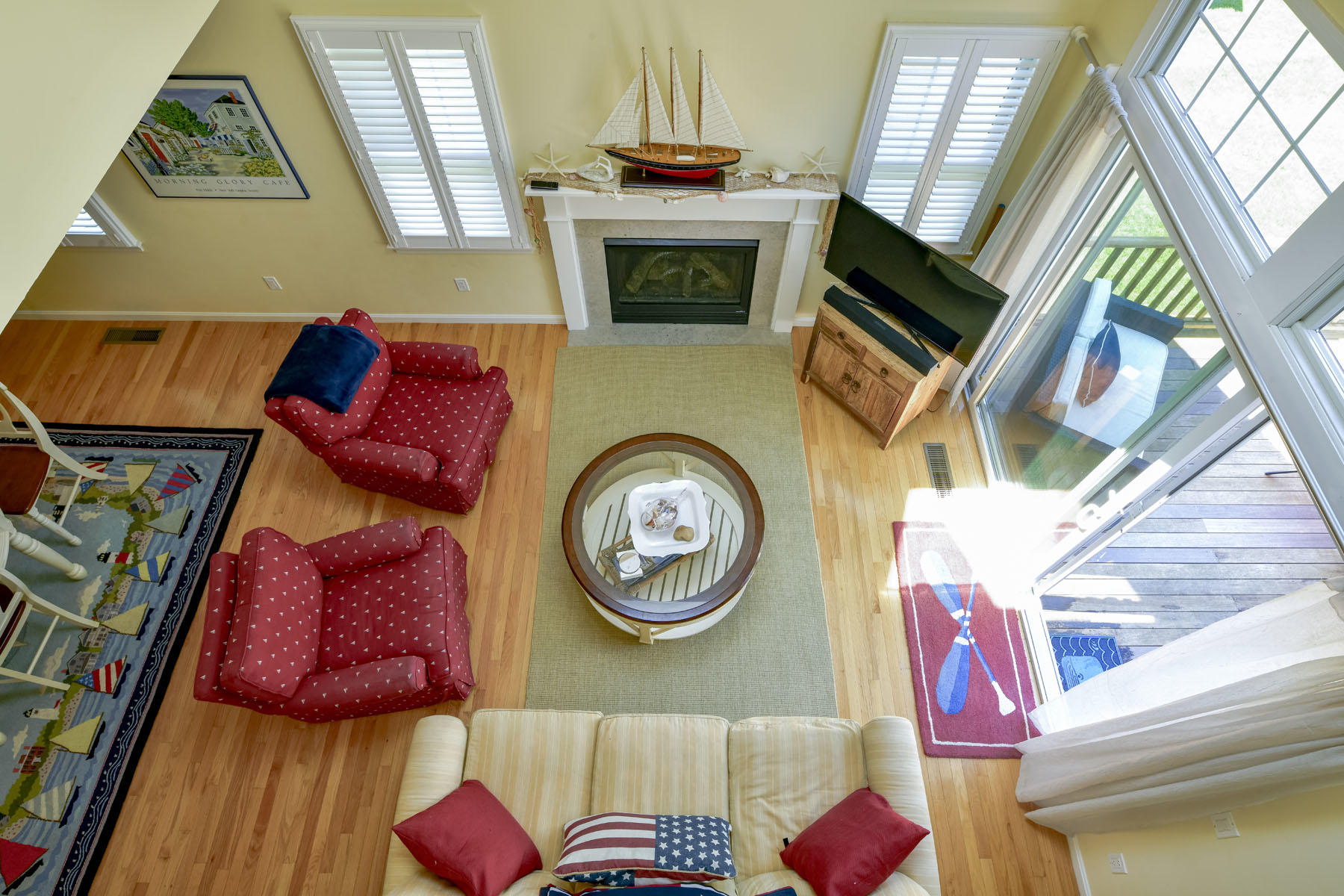 19 NW Landing Mashpee, MA 02649 - Photo 12 of 33 a living room with furniture and a fireplace