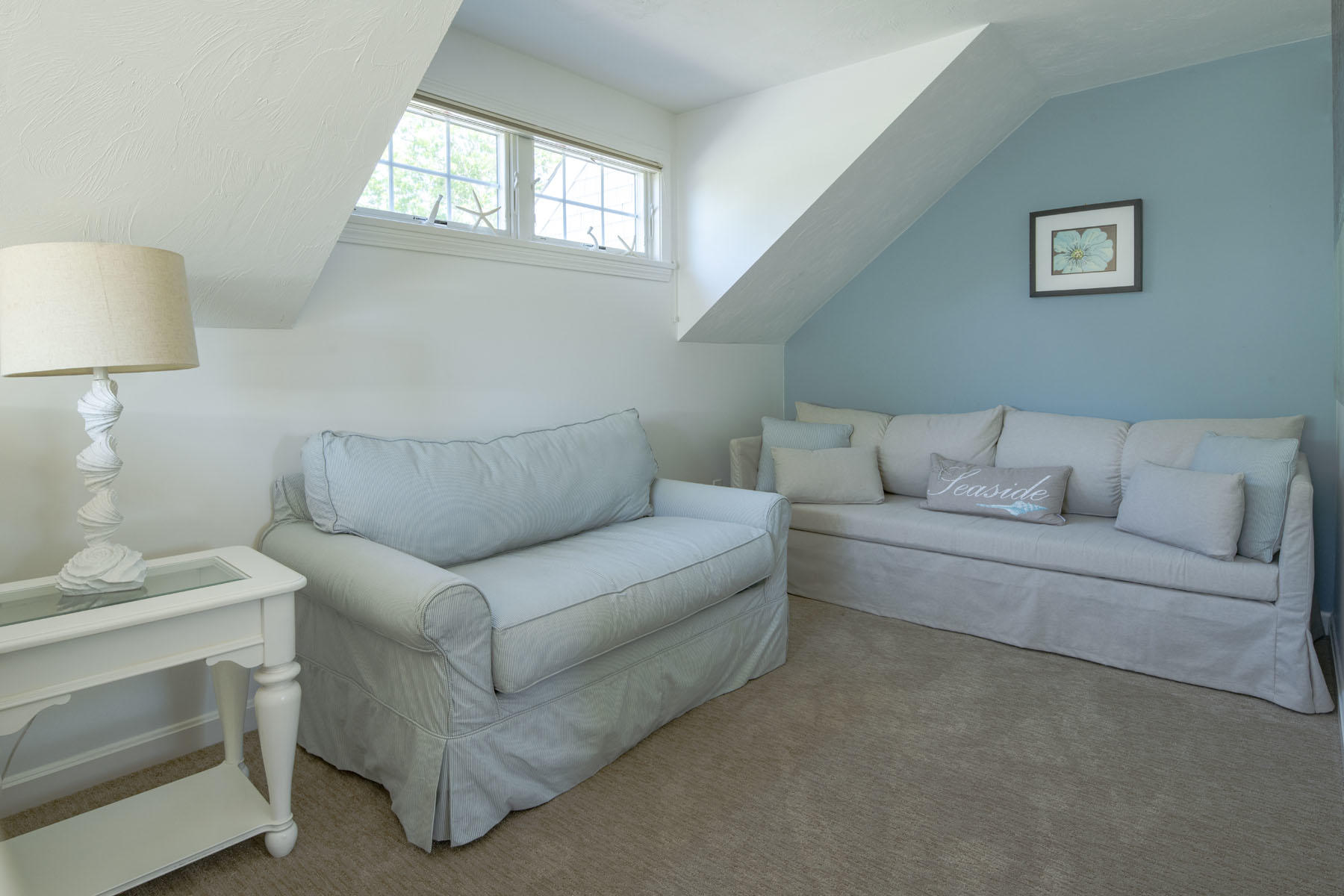 19 NW Landing Mashpee, MA 02649 - Photo 21 of 33 a living room with furniture a lamp and a window