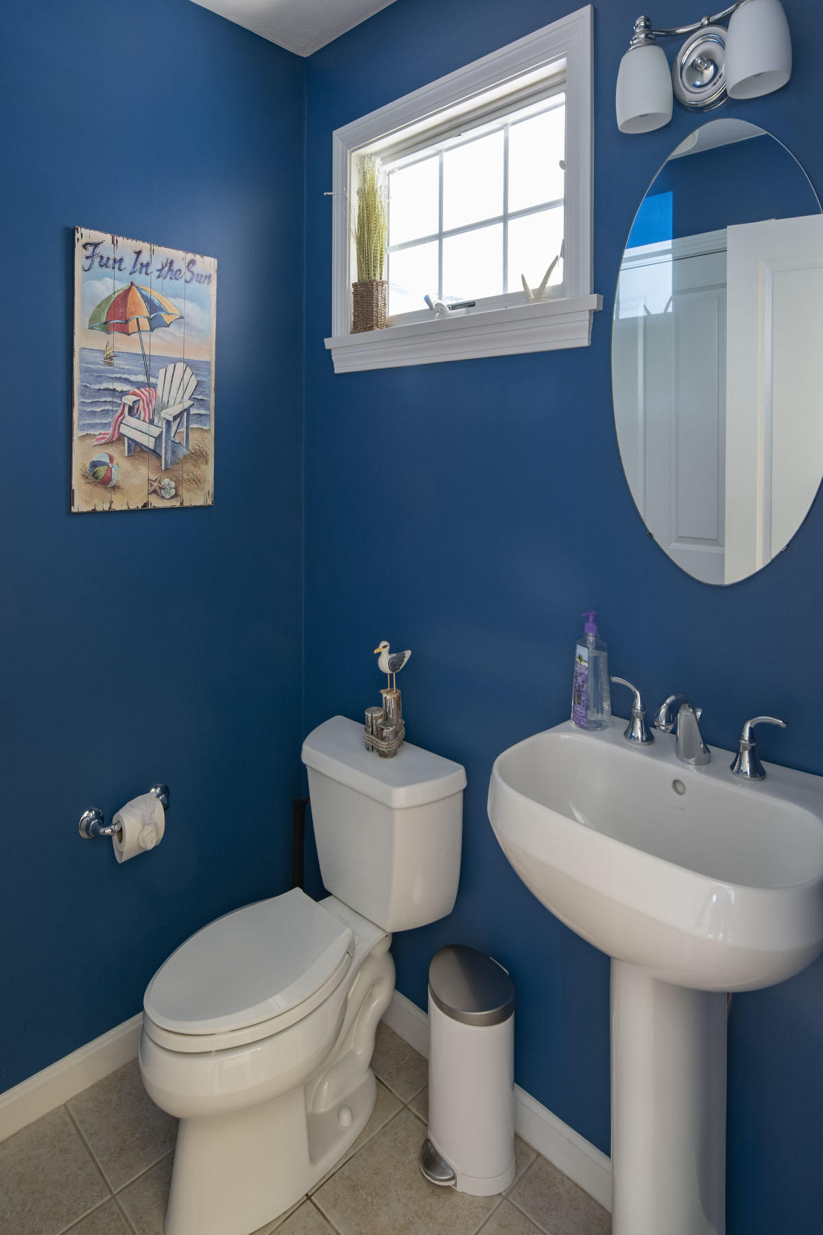 19 NW Landing Mashpee, MA 02649 - Photo 26 of 33 a bathroom with a toilet a sink and mirror