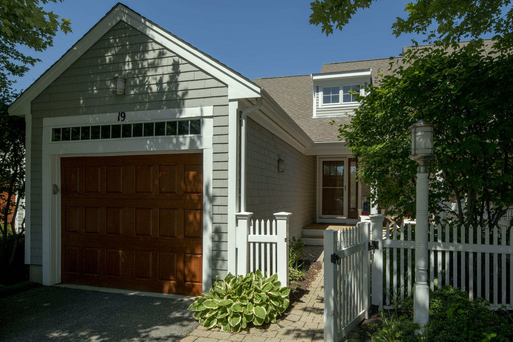 19 NW Landing Mashpee, MA 02649 - Photo 32 of 33 a front view of a house with garden
