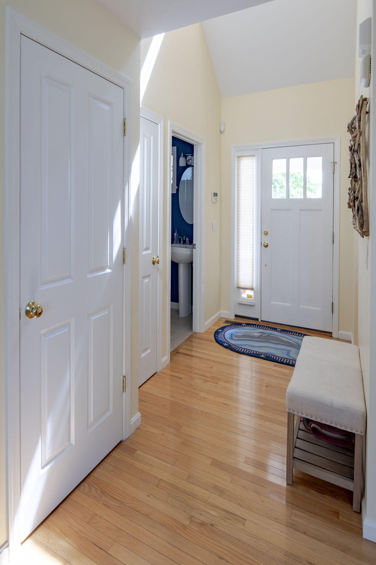 19 NW Landing Mashpee, MA 02649 - Photo 4 of 33 a view of a livingroom with wooden floor and staircase