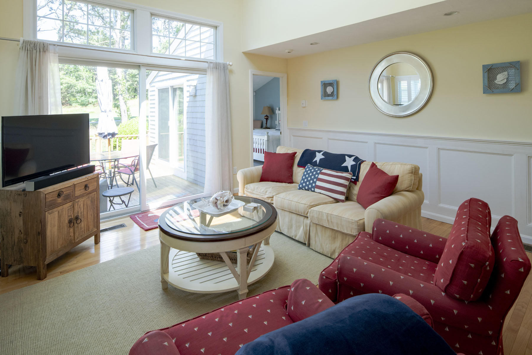 19 NW Landing Mashpee, MA 02649 - Photo 9 of 33 a living room with furniture and a flat screen tv