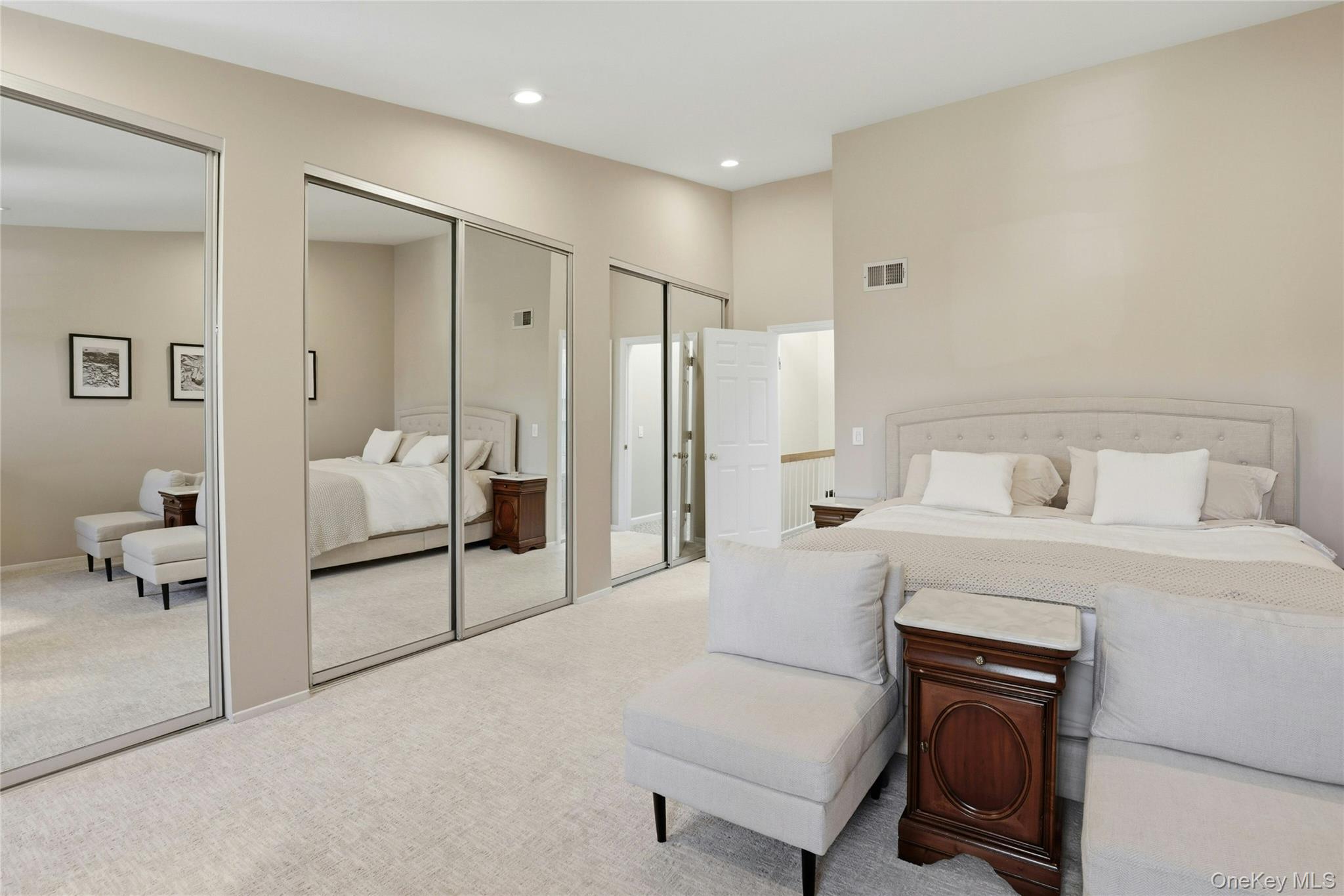 78 Hidden Ridge Drive Syosset, NY 11791 - Photo 11 of 21 a bedroom with a bed and a chair