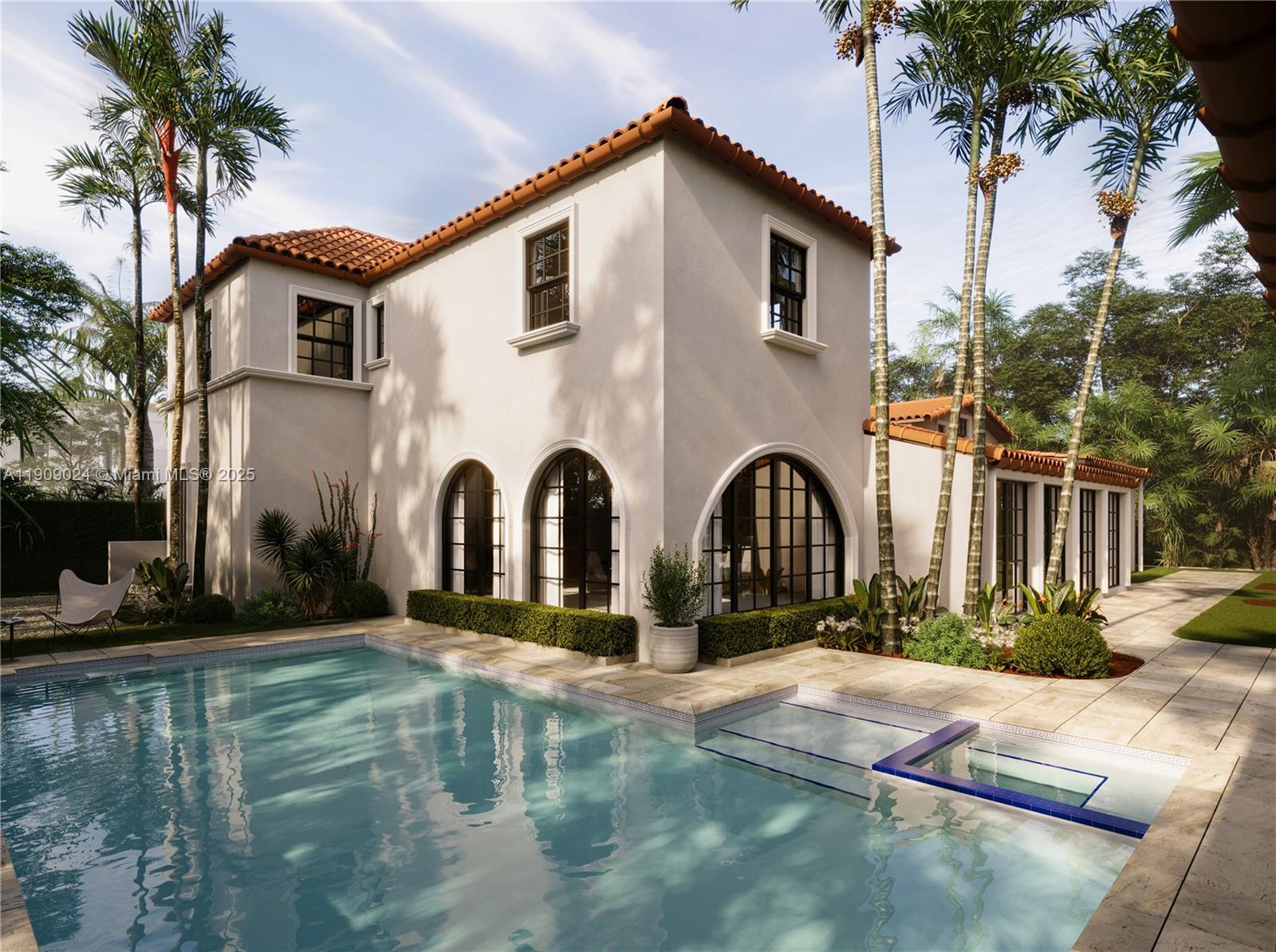 4727 North Bay Road Miami Beach, FL 33140 - Photo 1 of 15 a front view of a house with garden