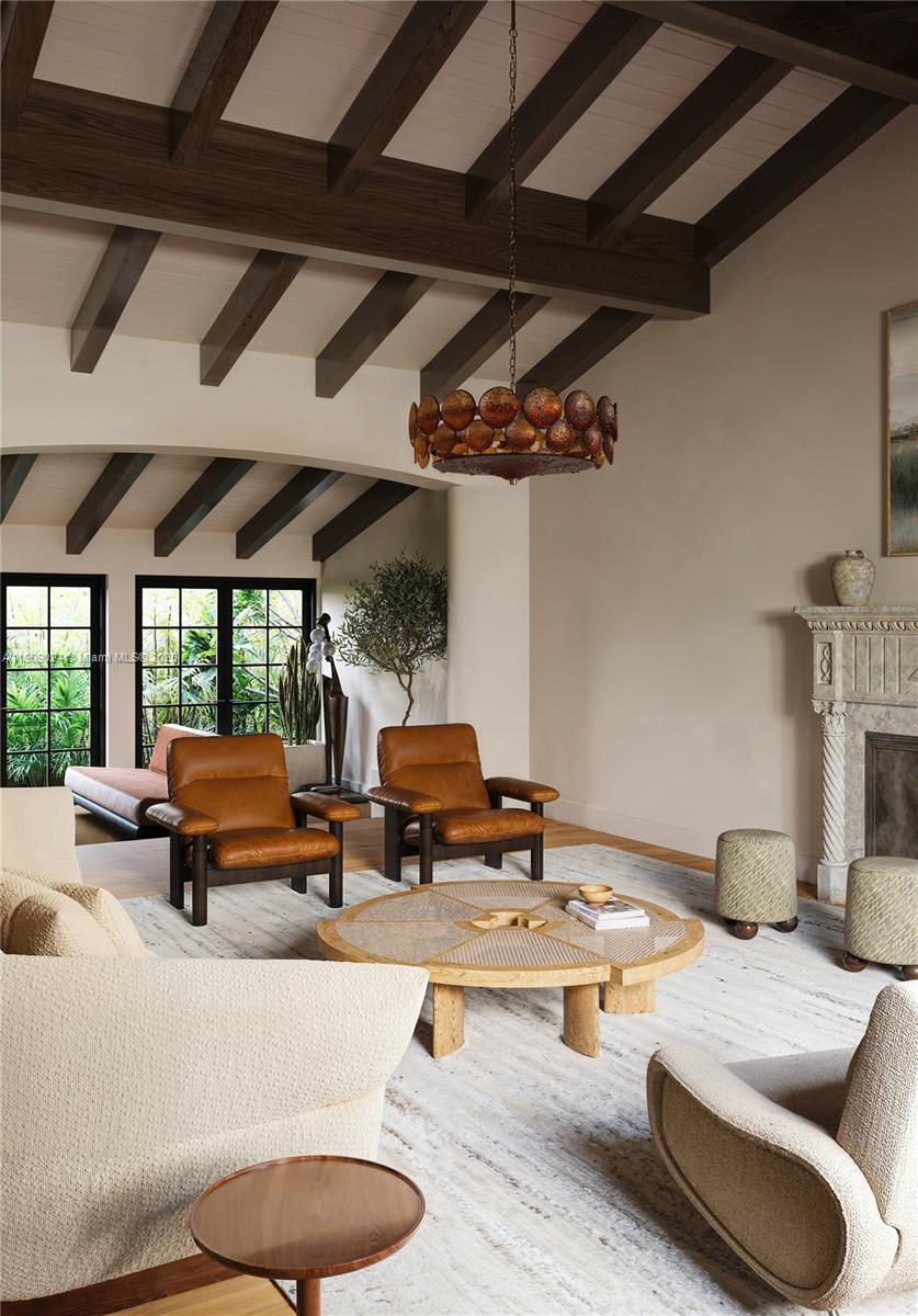 4727 North Bay Road Miami Beach, FL 33140 - Photo 3 of 15 a living room with furniture and a fireplace