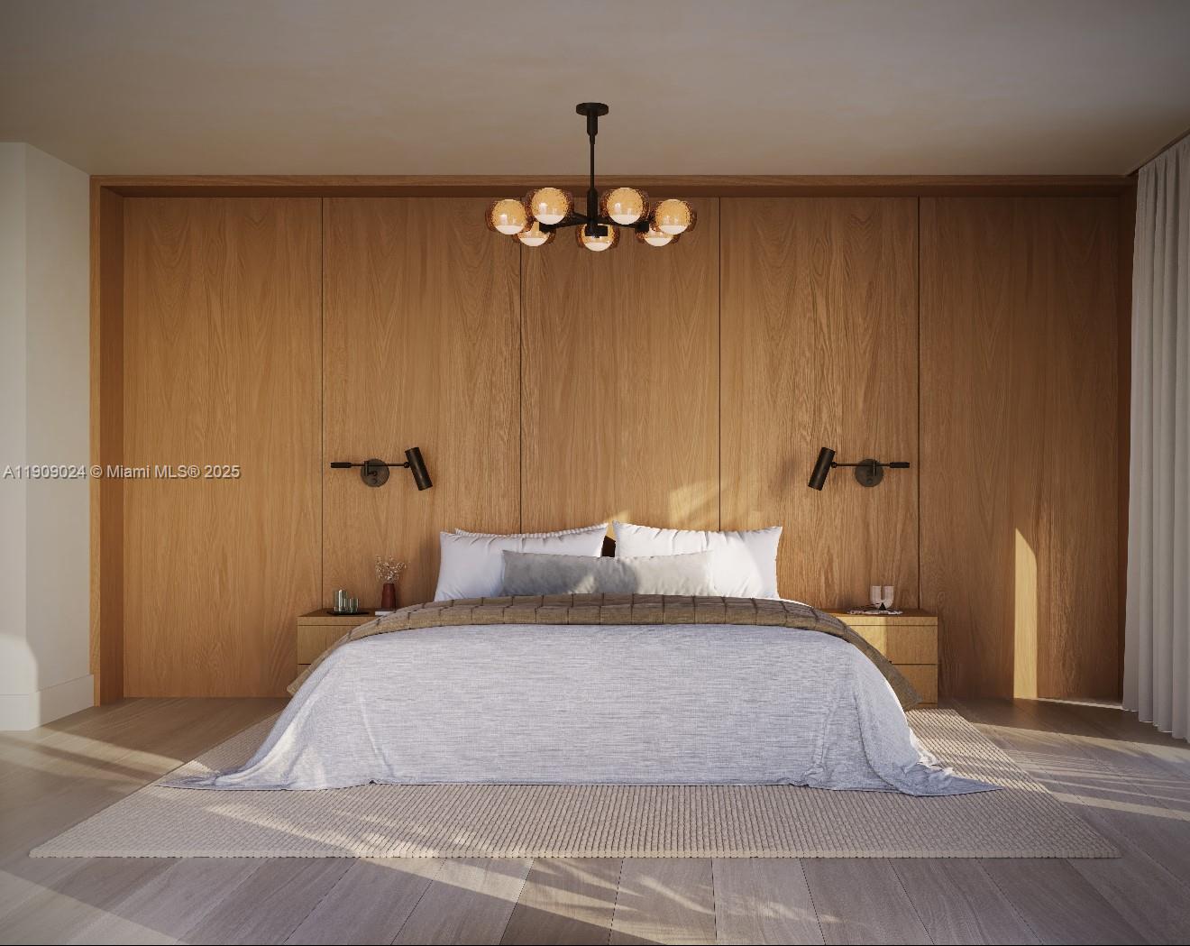 4727 North Bay Road Miami Beach, FL 33140 - Photo 6 of 15 a bedroom with a bed and a chandelier