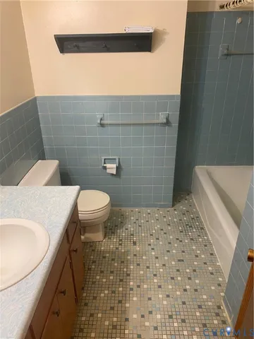 a bathroom with a sink and a toilet