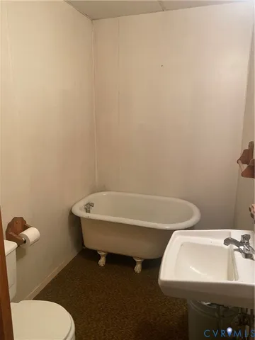 a bathroom with a sink and a toilet