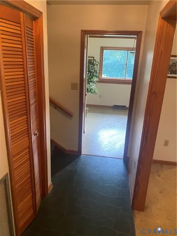 a view of hallway with stairs