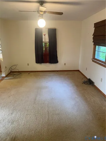a view of a livingroom with a staircase