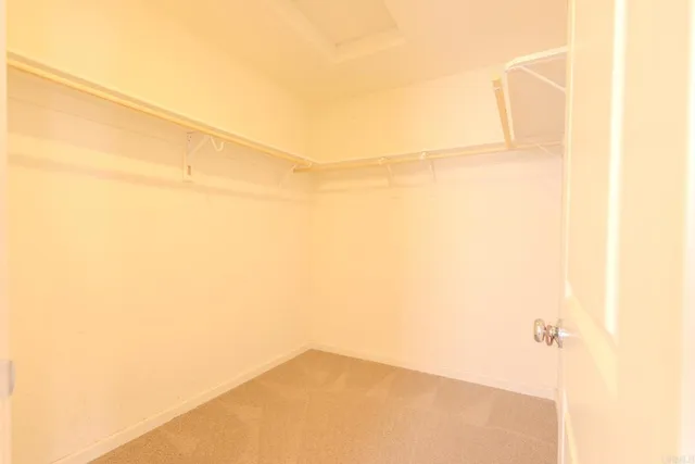 a view of a room with an empty space