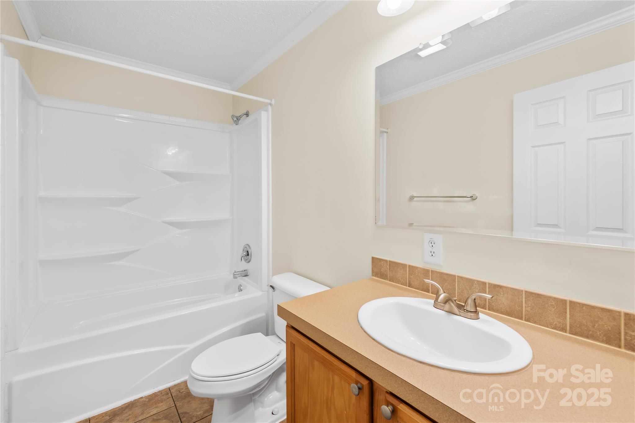 280 Harrill Dairy Road Forest City, NC 28043 - Photo 12 of 19 a bathroom with a granite countertop sink toilet a mirror and shower