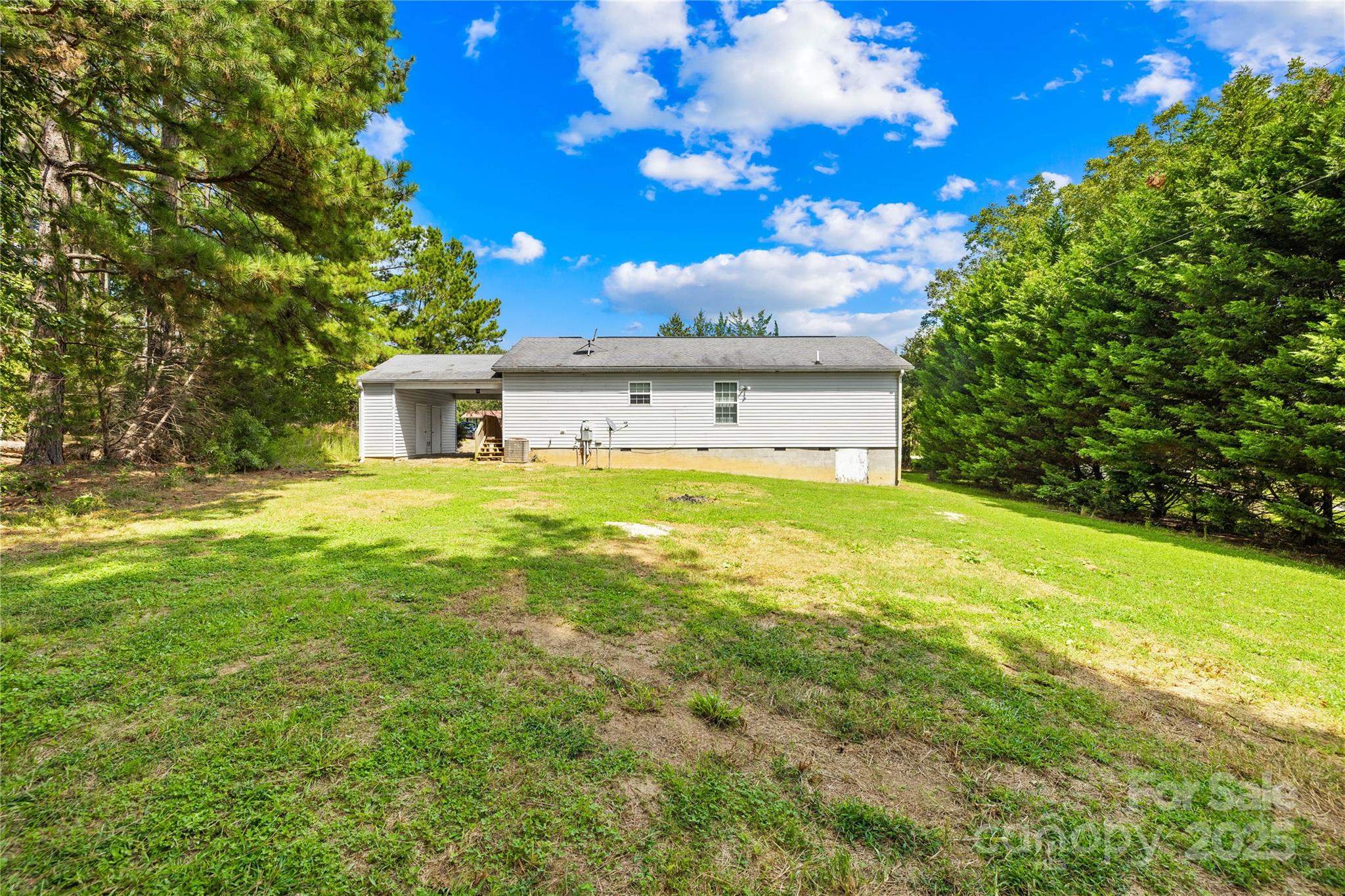 280 Harrill Dairy Road Forest City, NC 28043 - Photo 14 of 19 a view of a house with a yard balcony and a tree