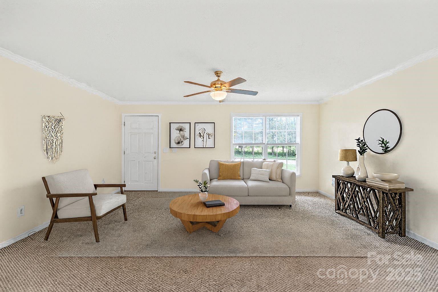 280 Harrill Dairy Road Forest City, NC 28043 - Photo 2 of 19 a living room with furniture a rug and a window