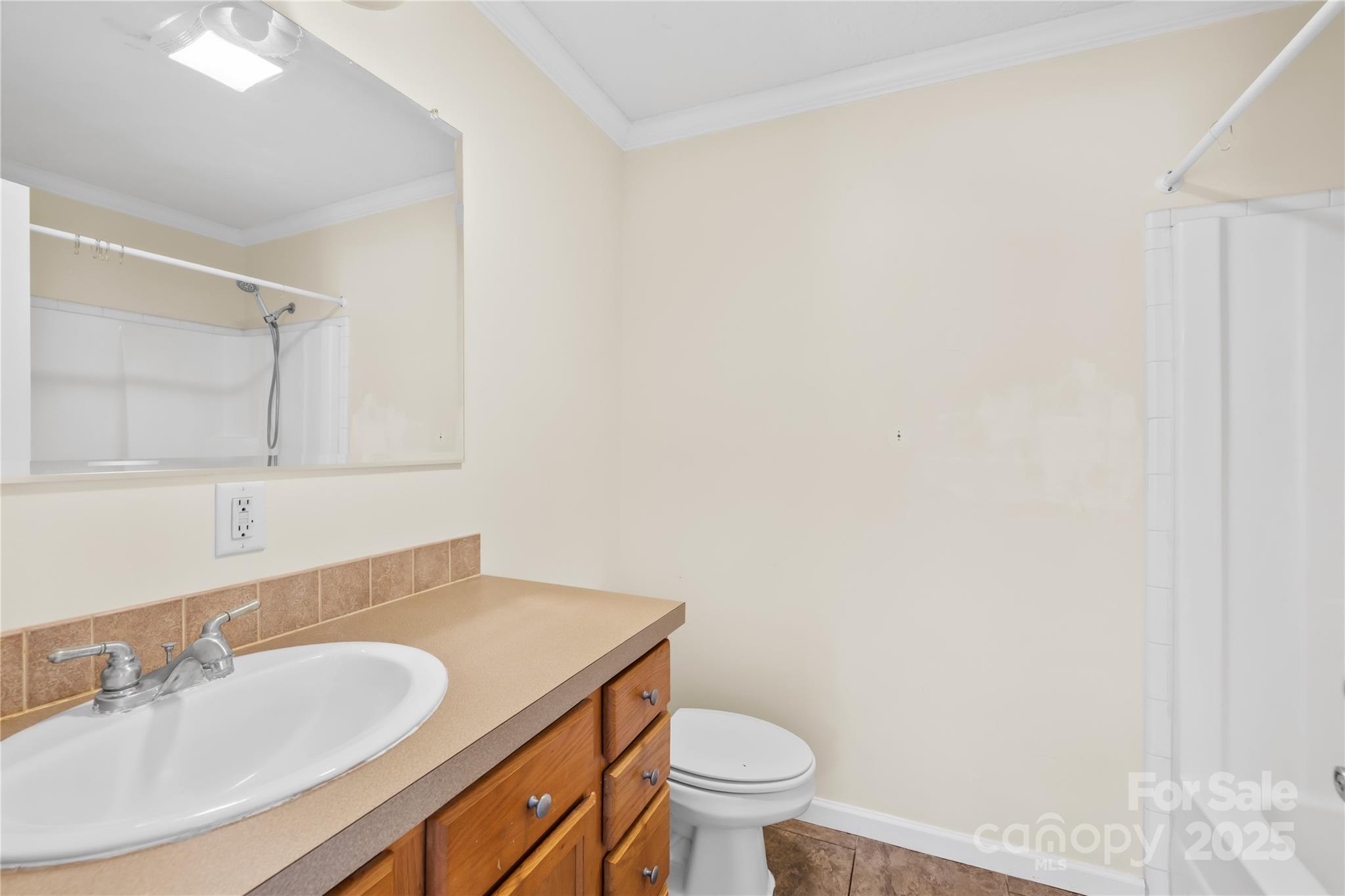 280 Harrill Dairy Road Forest City, NC 28043 - Photo 9 of 19 a bathroom with a sink and a toilet