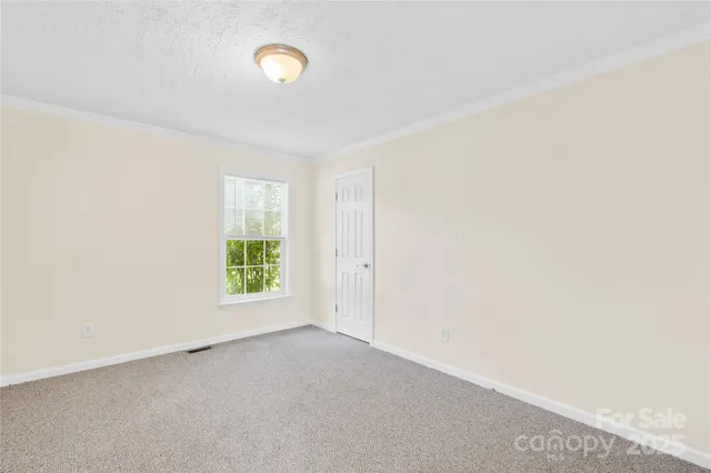 a view of a room that has a window in it