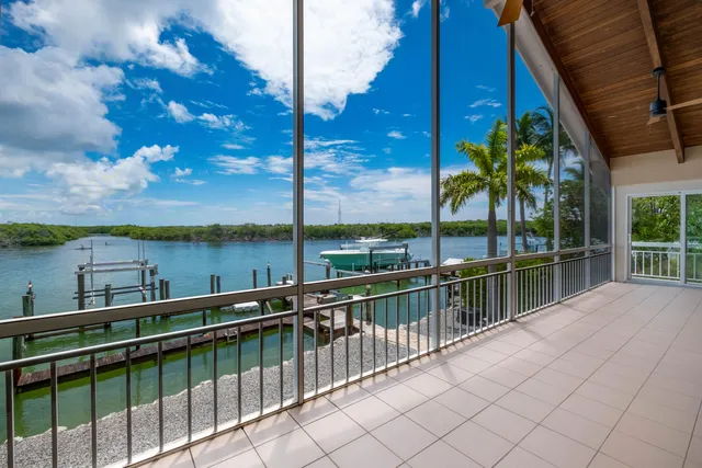 a view of a balcony with a lake view